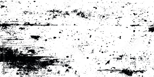 Black patches and rough scratch marks while transitions into lighter scattered textures and streaked diagonal lines.