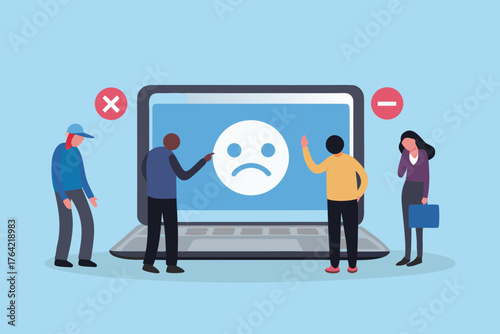 Diverse group of people reacting to a sad face emoji on a laptop screen with negative feedback symbols