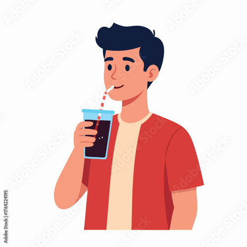 A young man is drinking a beverage from a plastic cup with a straw.