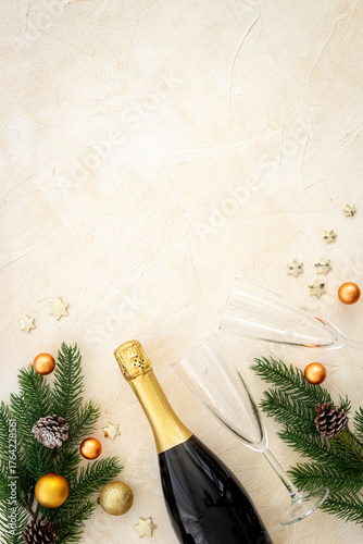 Wallpaper Mural Christmas fir tree branch with champagne bottle and decoration, top view. Happy New Year greeting card Torontodigital.ca
