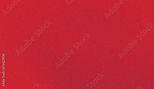 A close-up, full-frame shot of a textured, vibrant red fabric, likely felt or a similar material, with a uniform surface.