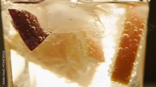 Refreshing citrus drink with fizzing bubbles, a vibrant and tasty experience for summer, perfect for celebrations and relaxing moments