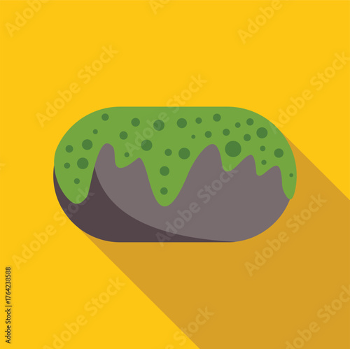 Gray rock covered by dripping green algae isolated on yellow background, suitable for environmental or nature related projects