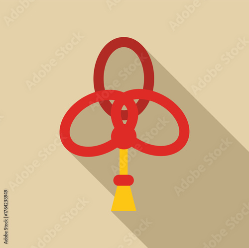 Red chinese knot with a yellow tassel, representing luck, prosperity, and harmony in asian cultures
