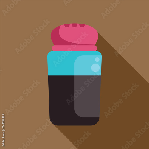 Colorful salt shaker with pink lid, blue body and black content casting long shadow on brown background