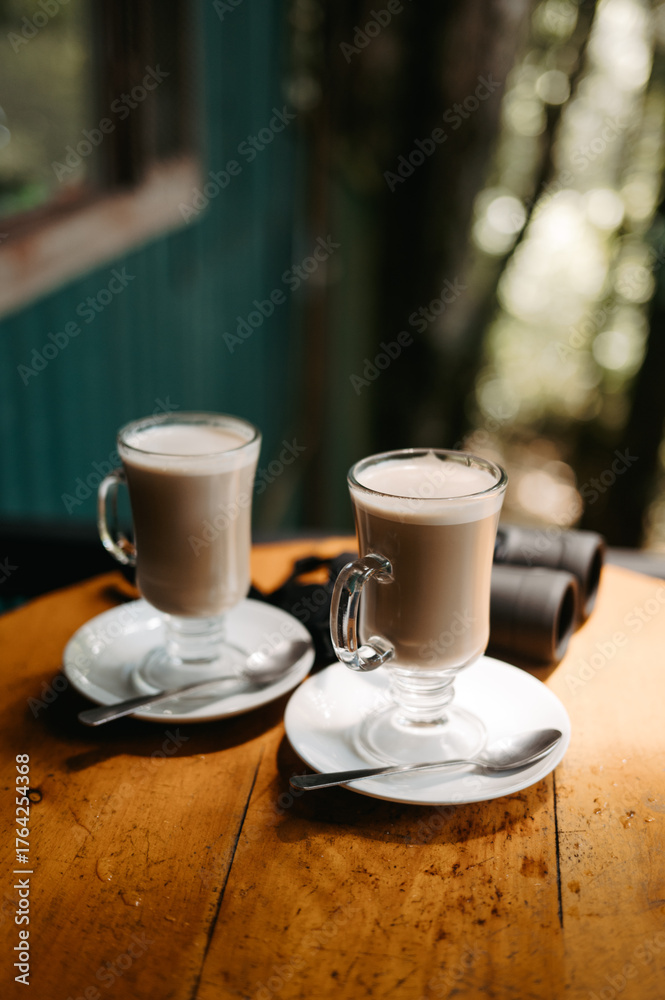 Obraz premium Coffee and Binoculars Ready for Birdwatching in Monteverde