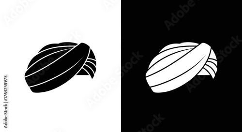 Inverted image showing a turban in black on white and white on black backgrounds.