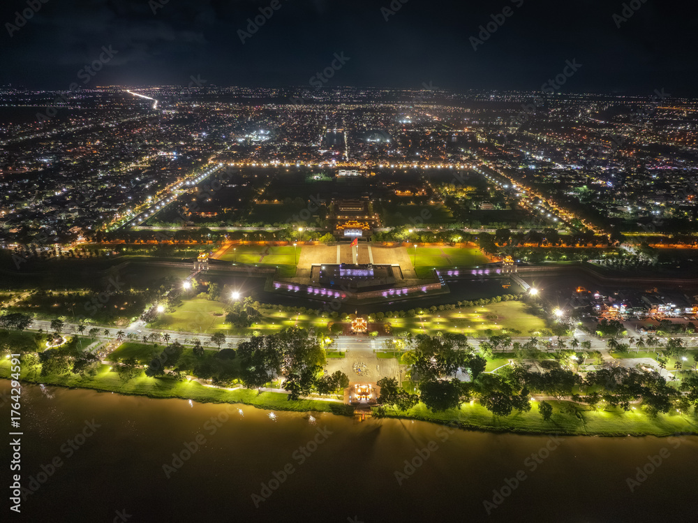 Fototapeta premium Aerial view of Hue Citadel and view of Hue city, Vietnam. Imperial Royal Palace of Nguyen dynasty.