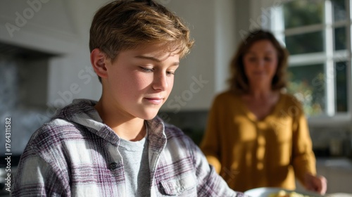 Boy, mother, kitchen, mealtime, family time