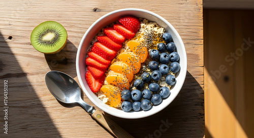 Vibrant fruit bowl with strawberries blueberries and kiwi