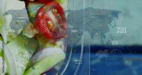 Displaying glass salad bowl on left in overlay with world map and data icons, copy space