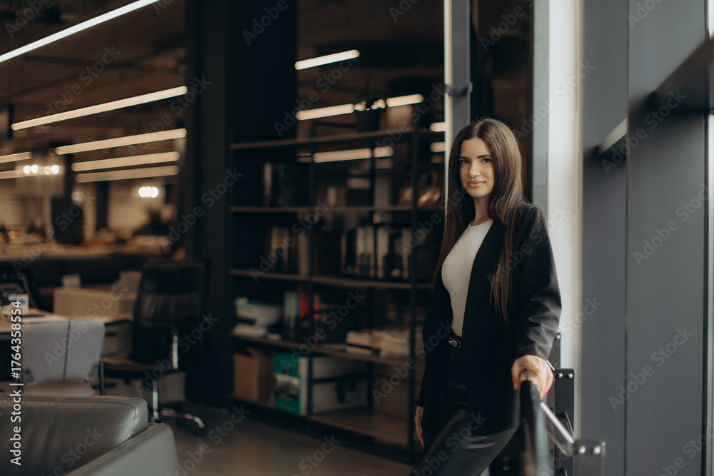 Fototapeta premium Confident Professional Woman in Modern Stylish Office Setting