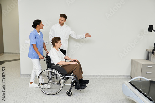 Принти на полотні Medical team guiding patient to MRI in a modern healthcare setting