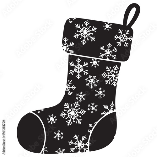 Snowflake patterned holiday stocking icon in black and white silhouette