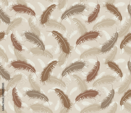 The seamless background with bird feathers.