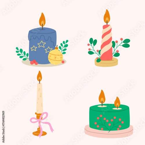 Colorful christmas candles with floral decorations and festive holiday glow