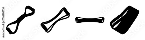 Various black resistance bands for fitness and exercise in a row isolated on white