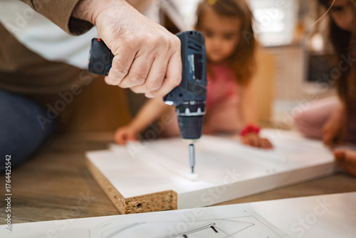 Wallpaper Mural Crafting together: a hands-on moment with tools and creativity Torontodigital.ca