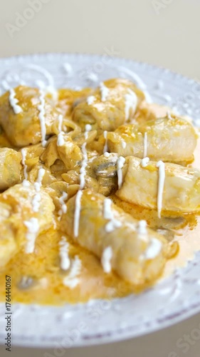 cabbage rolls topped with sour cream. High quality 4k footage