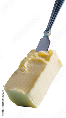 Butter Knife: A close-up shot captures the simple elegance of butter being expertly cut with a knife.