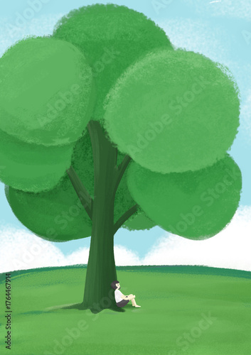 A person is sitting under a large green tree in a grassy field, enjoying a peaceful outdoor moment.