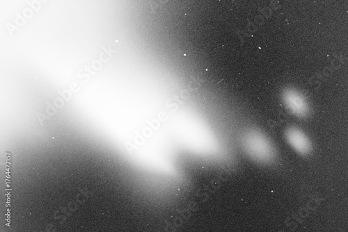 retro film overlay effect with scratch dust and light leaks, retro grain noisy film distressed texture light leak flare on black background,black and white abstract light background