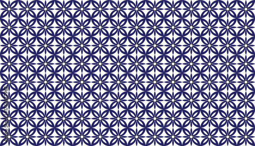 A seamless geometric floral pattern in blue and white, composed of repeated petal-like shapes forming symmetrical flower motifs. The minimalist monochrome design gives a modern and elegant
