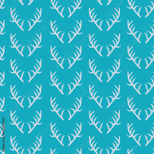 minimalist reindeer antlers silhouette  seamless pattern on blue  background. For Christmas fabric, textile and Christmas decoration