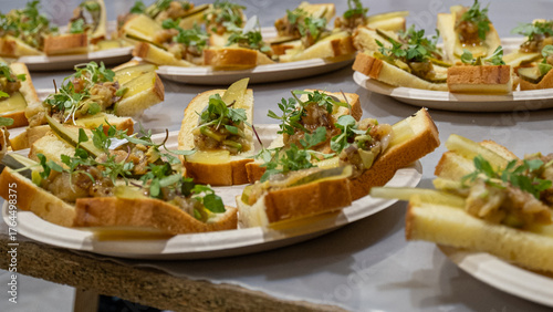 Gourmet canapés decorated with fresh parsley