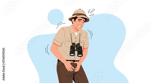 Man in safari outfit holding his crotch in pain.