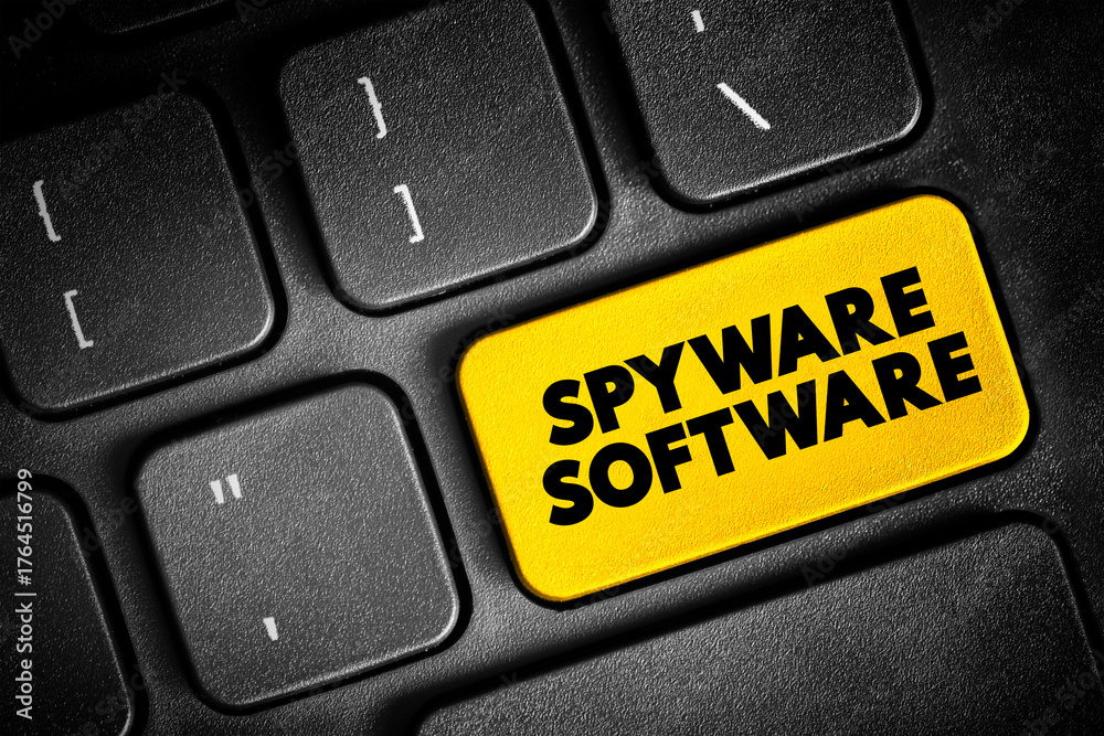 Fototapeta premium Spyware Software - malicious software that aims to gather information about a person or organization, text button on keyboard, concept background