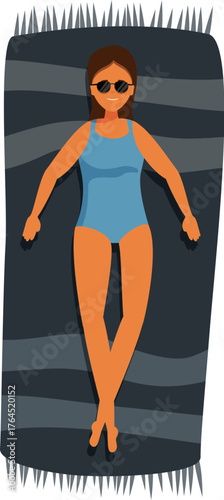 Young woman relaxing and enjoying sun on beach towel, wearing sunglasses and swimsuit
