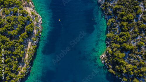 Aerial seascape with clear blue and green tones