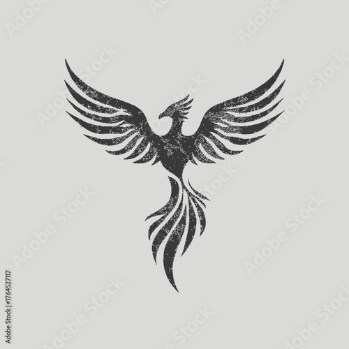 Stylized grunge mythical bird illustration with spreading wings, a powerful ancient firebird symbol of rebirth, strength, and eternity.