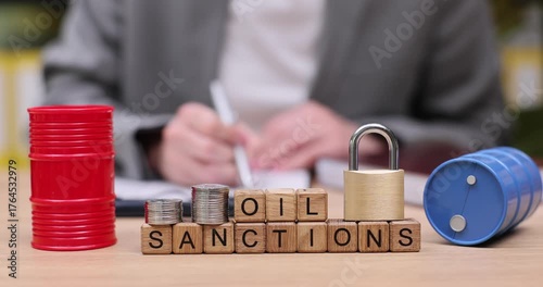 Unveiling the impact of oil sanctions on international trade in a bustling office setting