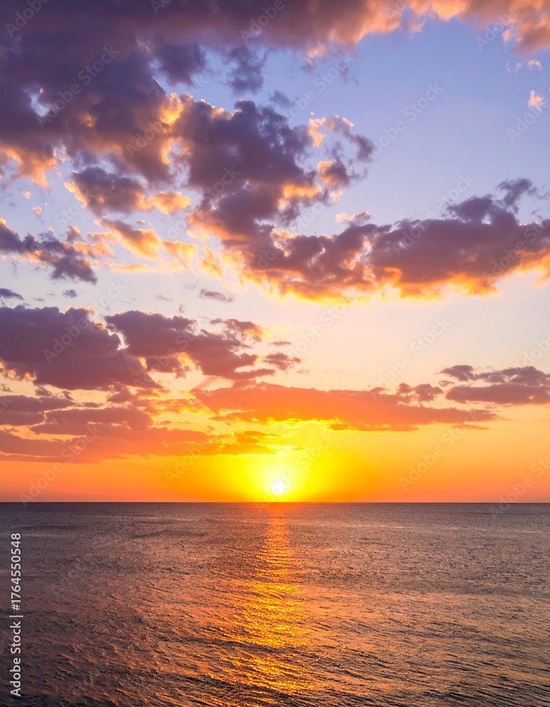 Fototapeta premium Colorful sunset over calm ocean
