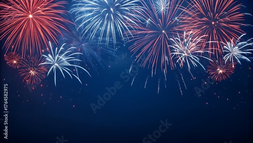 A dazzling display of red, white, and blue fireworks illuminates the night sky, creating a spectacular celebration of light and color, filling the darkness