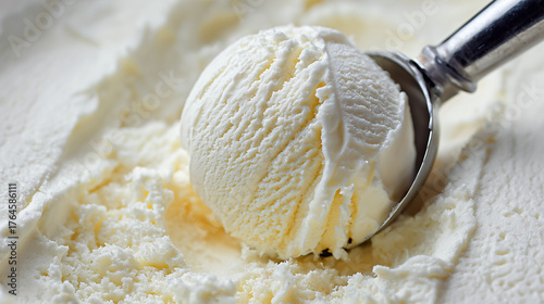 Scooping delicious creamy vanilla ice cream