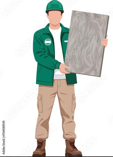 Construction worker holding a large gray tile sample.
