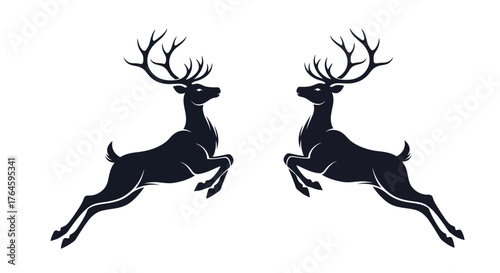 Silhouette of two leaping deer on a white background, perfect for heraldry or emblem design