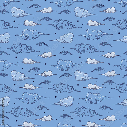Seamless blue pattern of cute blue clouds for packaging design. Happy children's dreams in the new year.