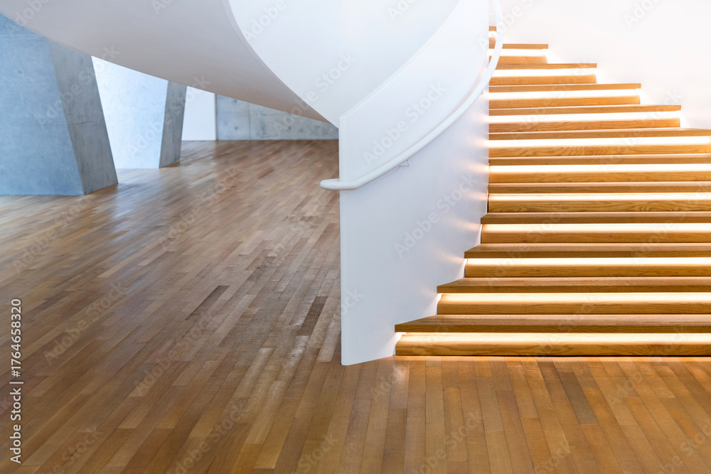 Naklejka premium Modern spiral staircase inside building