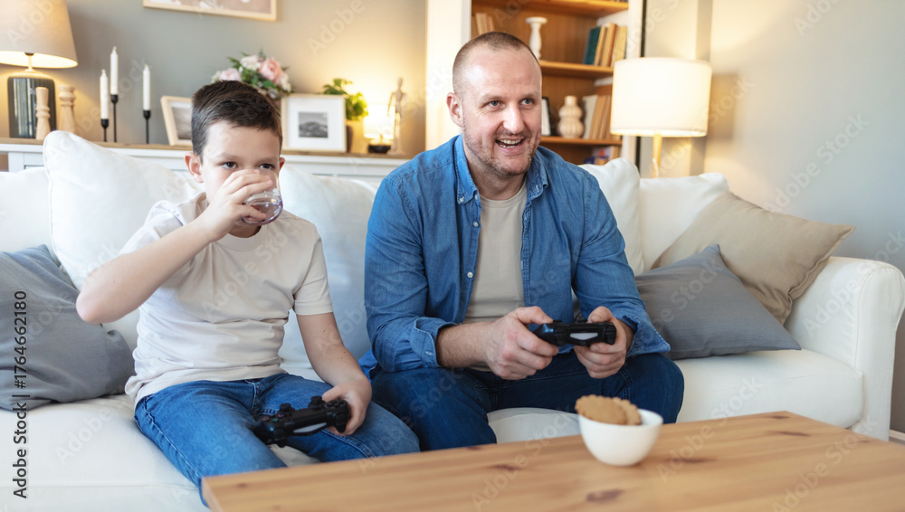 Obraz premium Man, child and play games with controller for streaming video, racing match and sports challenge. Father, son and console with online competition, fun entertainment and activity subscription at house.