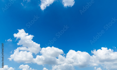 Background of blue sky with some white clouds