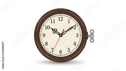 A vintage pocket watch with Roman numerals and a winding key