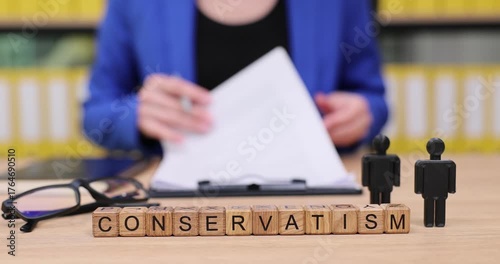 Exploring conservatism through thoughtful analysis and discussion in a modern workspace