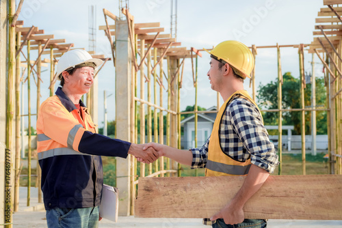 Diverse Team of Specialists Use Tablet Computer on Construction Site. Real Estate Building Project with Civil Engineer, Architect, Business Investor and General Worker Discussing Plan Details.