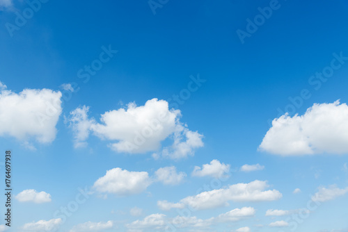 Fototapeta Naklejka Na Ścianę i Meble -  Background of blue sky with some white clouds