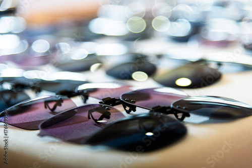 Clip sunglasses are displayed in the store