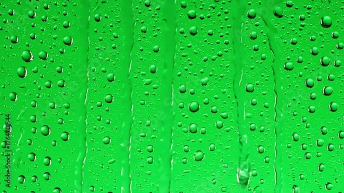 Wallpaper Mural Chroma Key Visual Effect with rain drops falling down on glass green screen background water droplets window distortion, overlay, glitch, static noise, scan lines black background, 4k animated video Torontodigital.ca